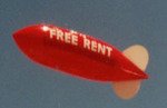 Advertising Blimp - Free Rent lettering. Blimp advertising is affordable.