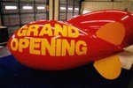 11ft. blimp with simple artwork - Grand Opening