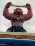 Queen Kong inflatables and giant gorilla cold-air advertising inflatables available for sale and rent. 25ft. pink kong with swim suit
