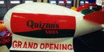 advertising blimp - Quizno's logo