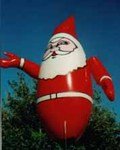 Santa - 11' helium inflatable. Affordable inflatable that really attracts attention.