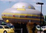UFO balloons - 25ft. tall UFO cold-air advertising inflatables.