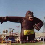 custom Advertising inflatables - cold-air Kong inflatables in stock - custom banners and artwork available. Kongs and gorilla balloons are our most popular shapes! 40ft. brown Kong - HUGE!