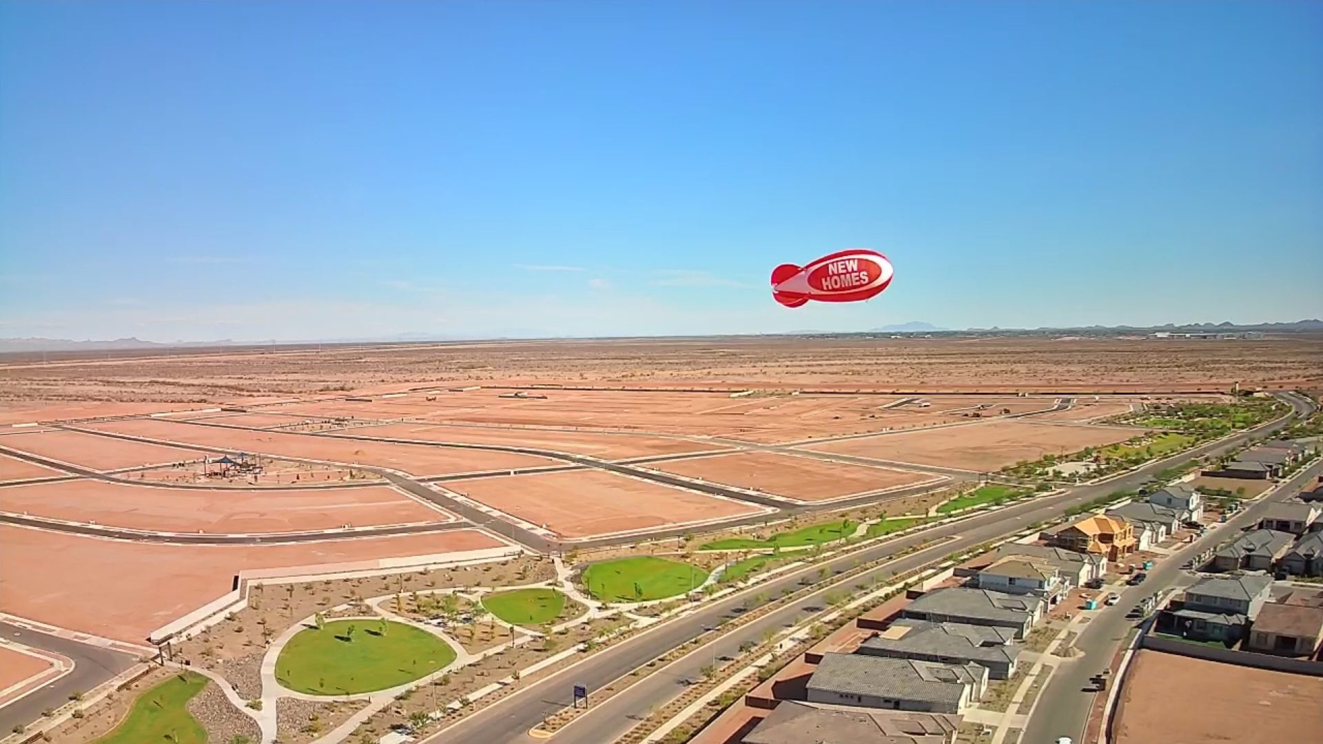 Marketing blimp over Tripointe Homes development